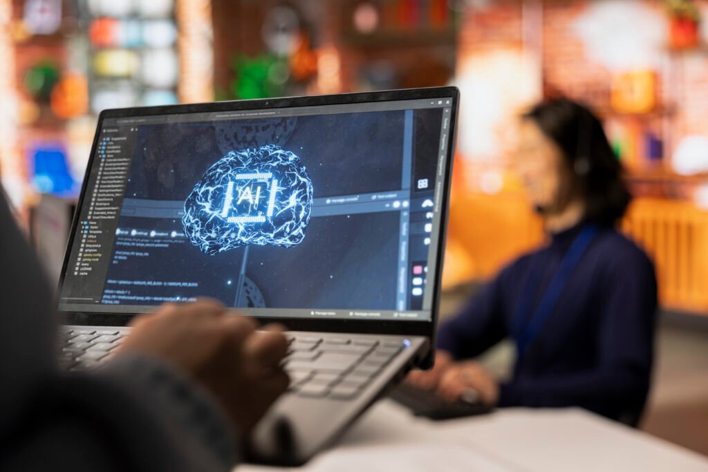 Call center worker uses AI technology on laptop to provide quick replies to common customer queries, close up. Customer service agent generates automated responses to clients using AI tech on notebook